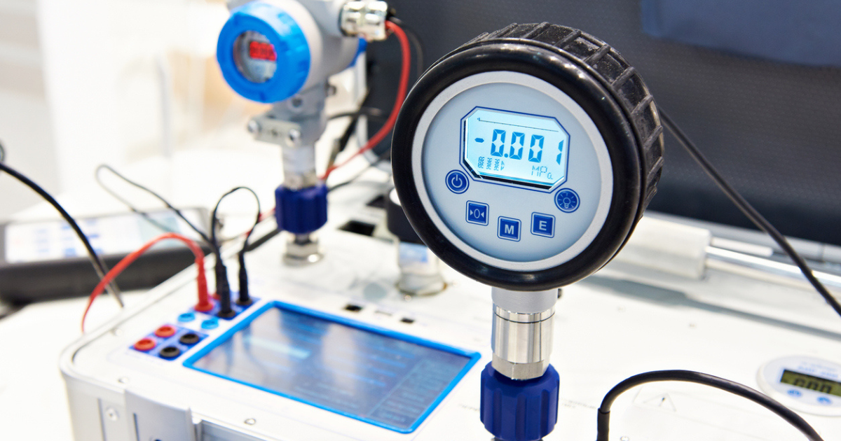 A scientific pressure gauge in a cannabis lab.